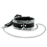 a black leather leash with a chain attached to it