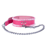 a pink leash with a chain attached to it