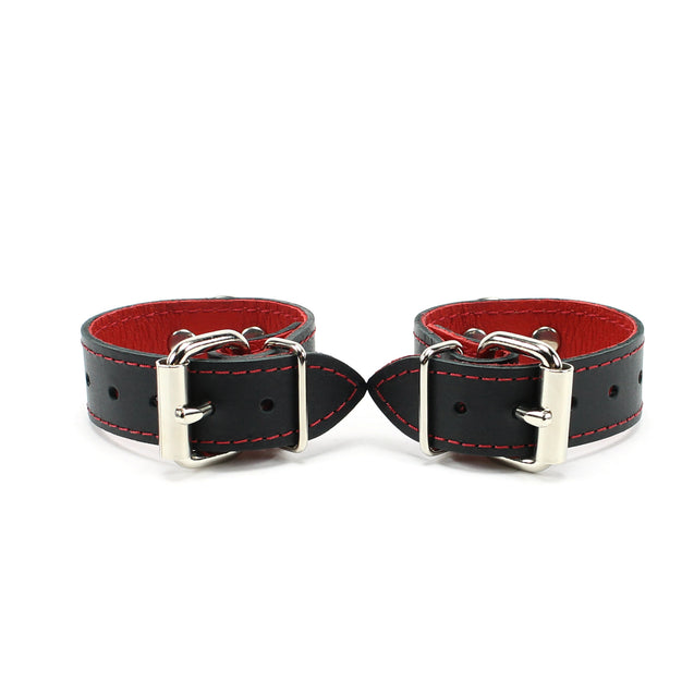back of 1-inch wide red padded leather BDSM cuffs