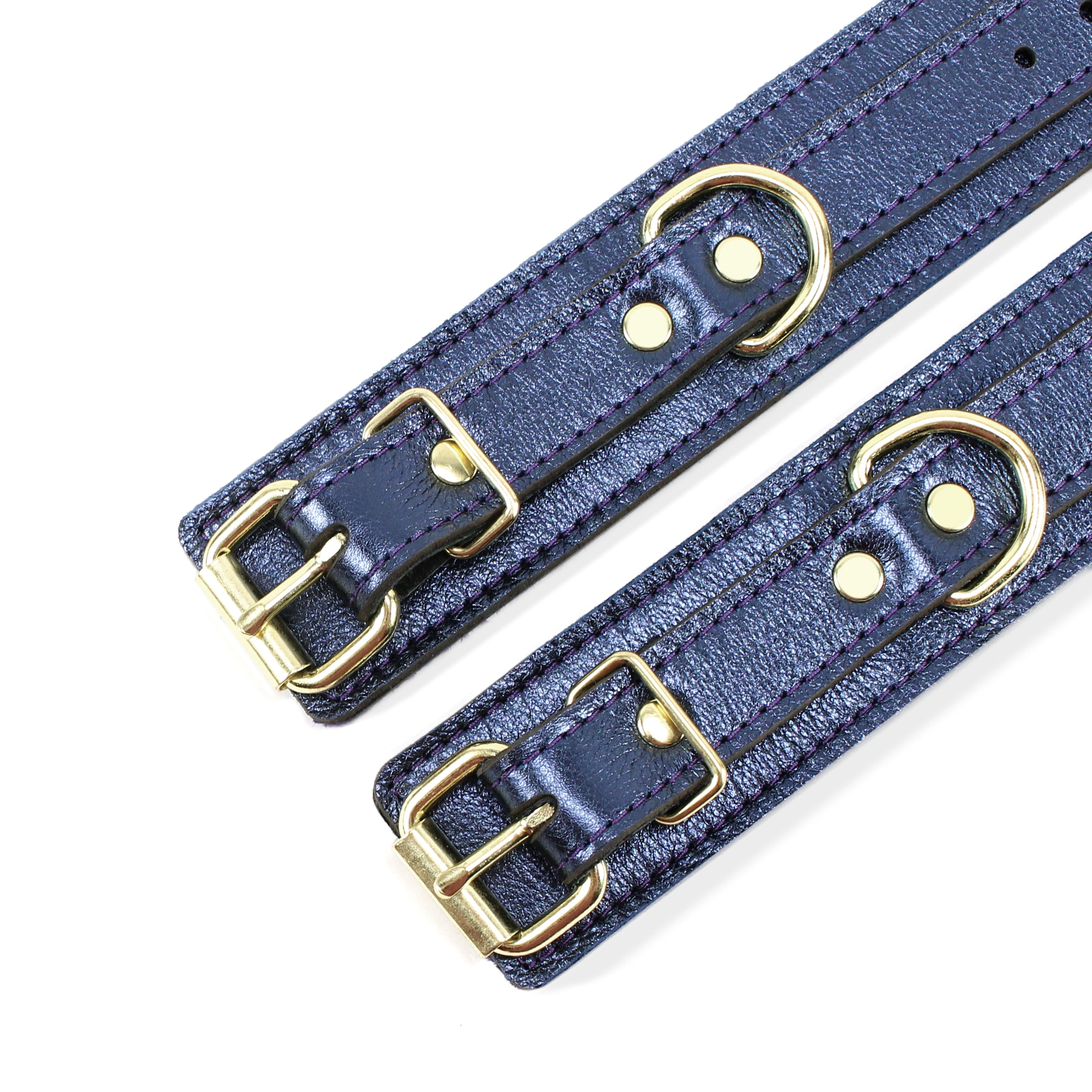 Sonya Luxury Sapphire Blue Metallic Leather cuffs with gold hardware details