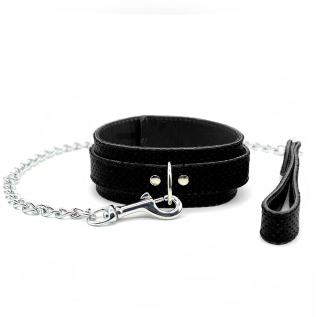 Black perforated leather bondage collar with matching BDSM lead