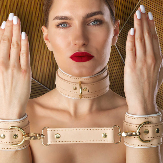High-end nude leather bondage cuff connector on model